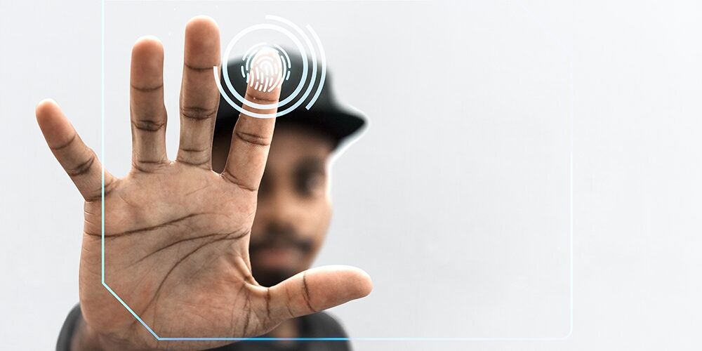 Black man scanning his finger